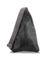 A black leather sling bag with a wide gray strap, lying against a plain white background, exemplifies practical fashion. The Andie by Bed Stu seamlessly blends style and functionality.
