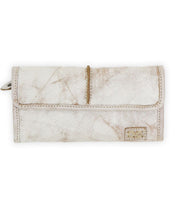 The Canton by Bed Stu is a compact wallet made of leather with a distressed texture and features a strap closure, displayed against a white background.