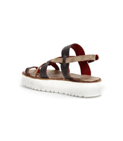 A multicolor Crawler strappy upper sandal with a white sole by Bed Stu.