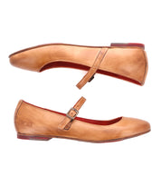 A pair of tan Mary Jane style flats with an adjustable strap and red lining, shown from the side profile on a white background, perfectly embodying the ballerinacore trend is the Shuffle III by Bed Stu.