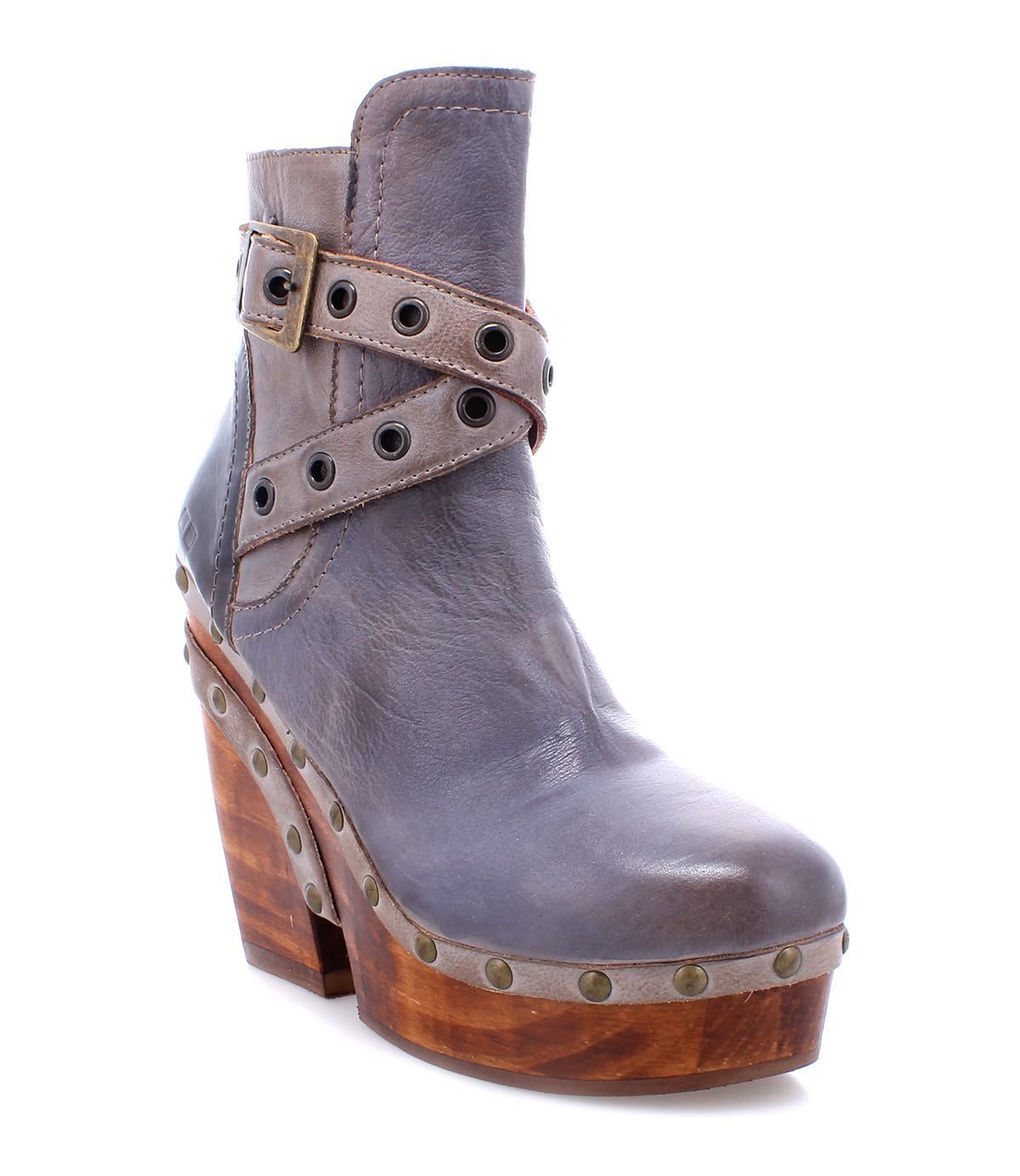 An Adore women's ankle boot with a wooden platform and metal stud details by Bed Stu.