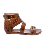 A women's brown Artemis sandal with straps and buckles by Bed Stu.
