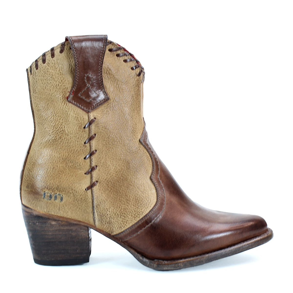 The Baila II Ankle-high cowboy boot by Bed Stu is crafted from two-tone leather, featuring a brown toe and heel with light tan sides, decorative stitching, and a wooden block heel that exudes Western-inspired style.