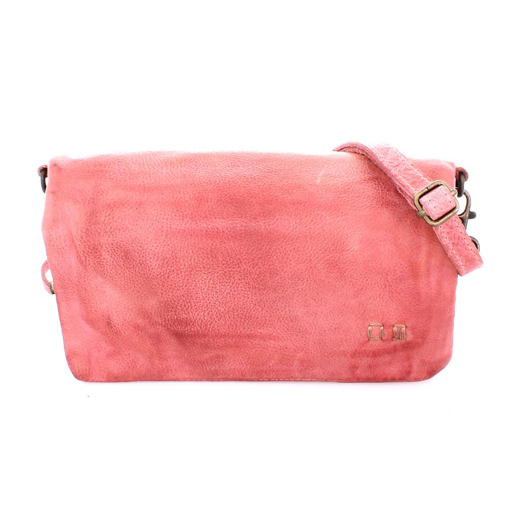 A pink leather Cadence crossbody bag with an adjustable strap from Bed Stu.
