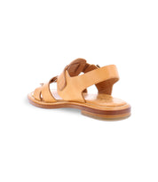 A Italian made sandal is natural color with fisherman style