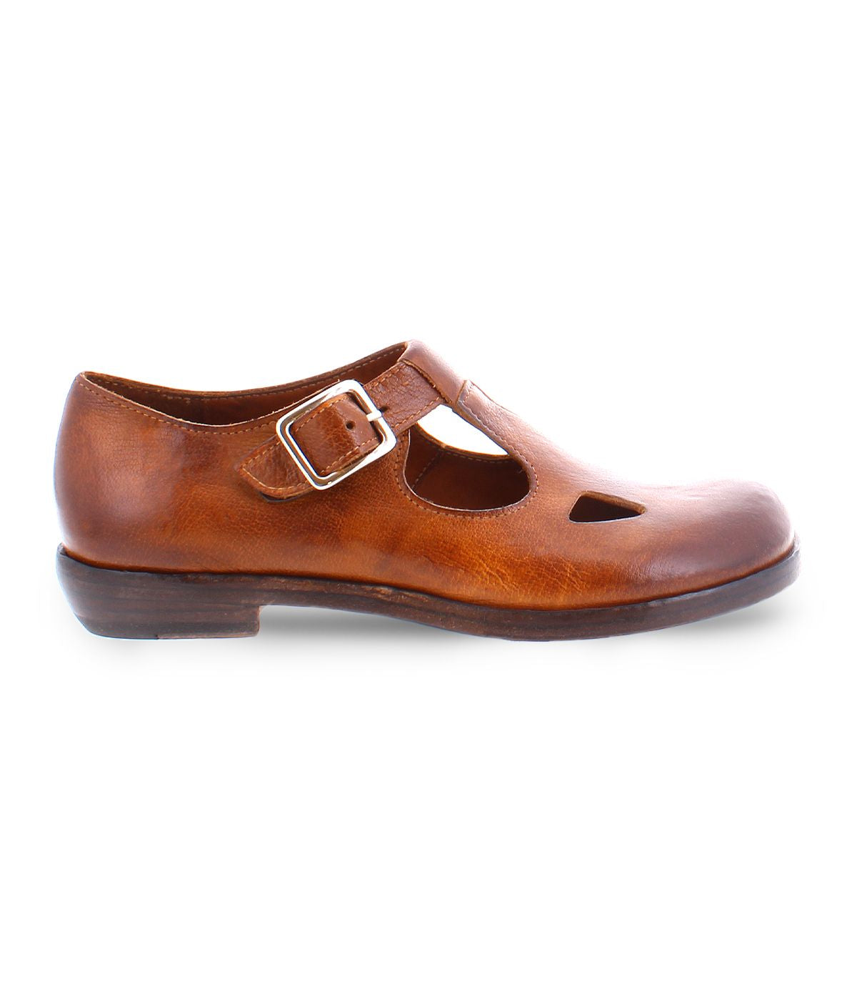 A product shot of a  brown leather shoe for women made with Italian leather and has cutouts in a t-strap  type of shoe. 