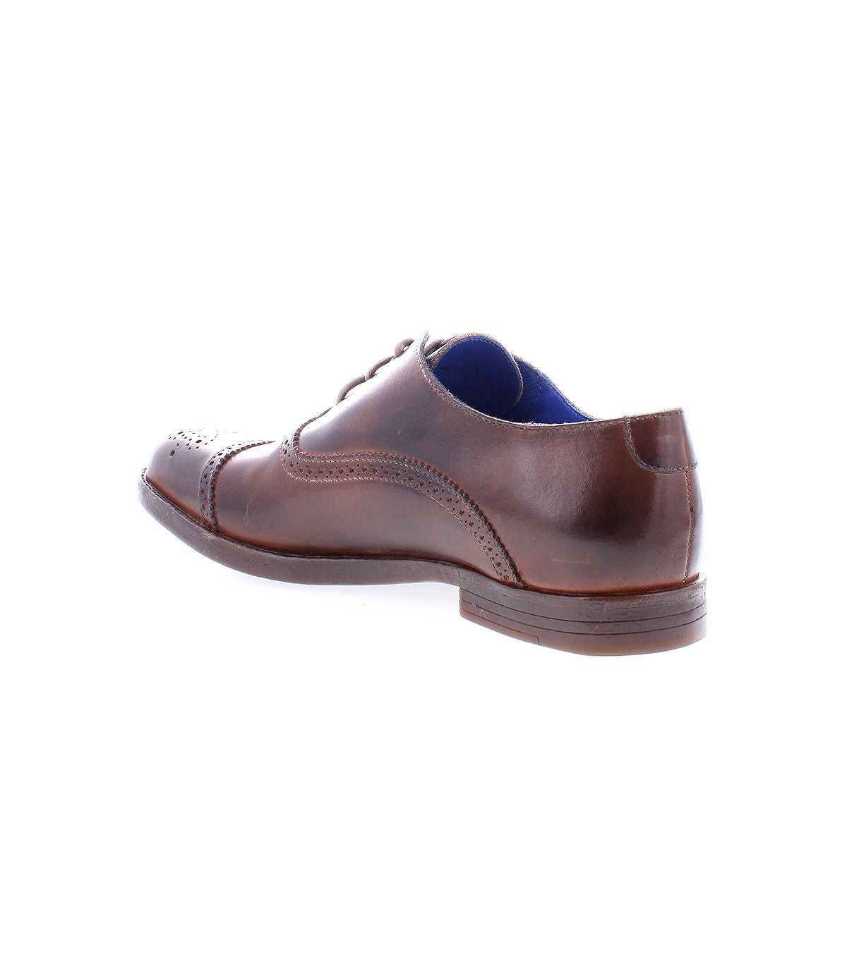 The Donatello II by Bed Stu is a versatile leather dress Oxford that showcases elegant brogue detailing from the side against a white background.