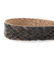 A Dreamweaver woven leather belt on a white background by Bed Stu.