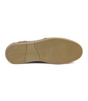 The sole of the Formation sneaker by Bed Stu showcases a ribbed pattern and a flat, beige surface, encapsulating the classic vulcanized style.