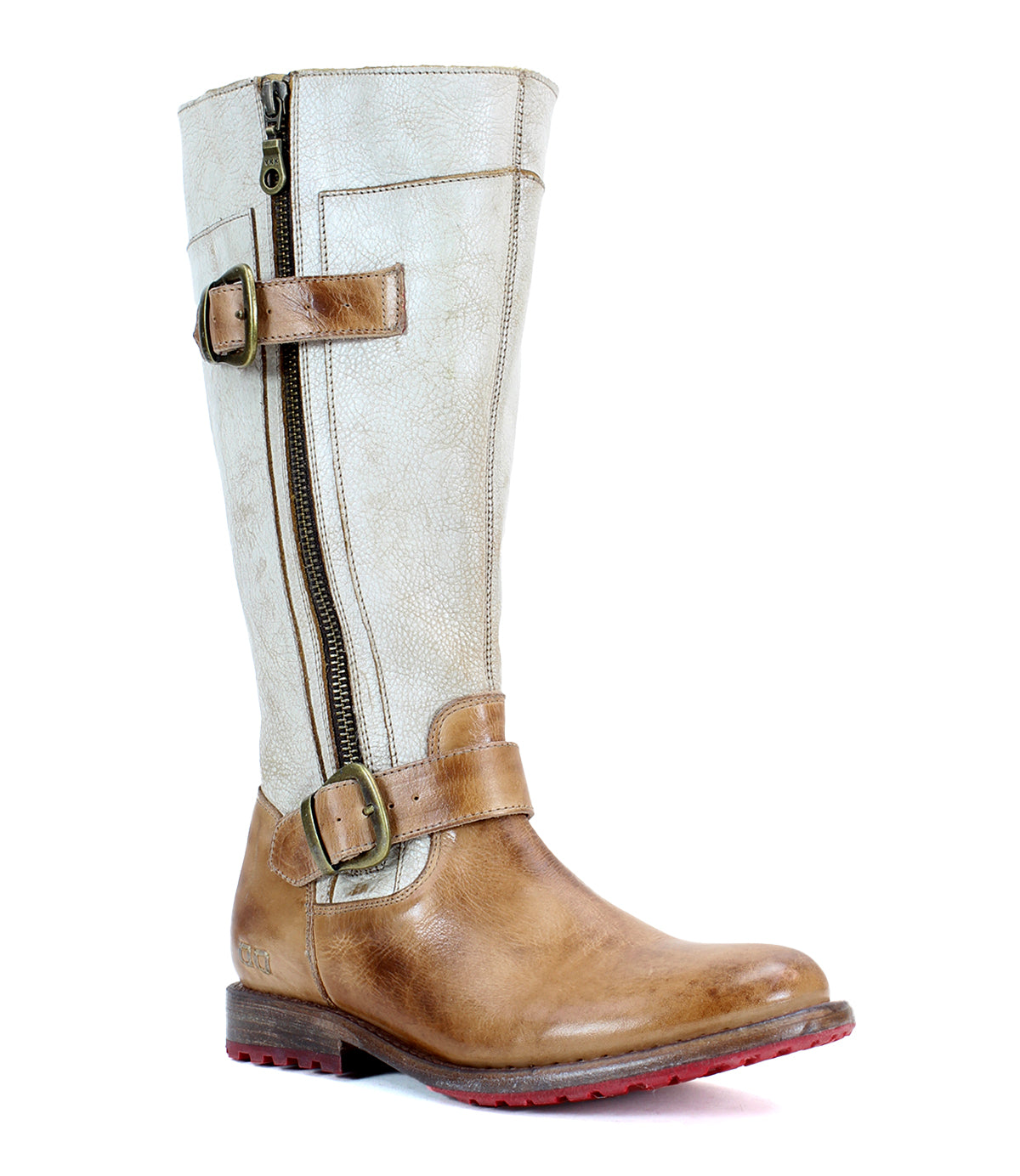 A brown and beige mid-calf leather boot featuring a side zipper, dual buckles, and a striking red sole. The durable lug outsole ensures long-lasting wear, effectively combining rugged and fashionable elements. The Gogo Lug from Bed Stu impresses with its unique design and functionality.