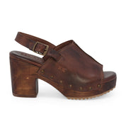 A women's brown clog sandal with wooden heel called Marie by Bed Stu.