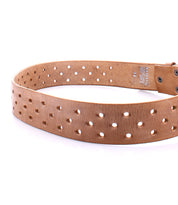 A tan vegetable-tanned leather belt with multiple perforated holes, featuring a tag that reads "Bed Stu" and the size "34." This piece, named Mccoy, blends modern aesthetics with timeless design for a versatile wardrobe staple.