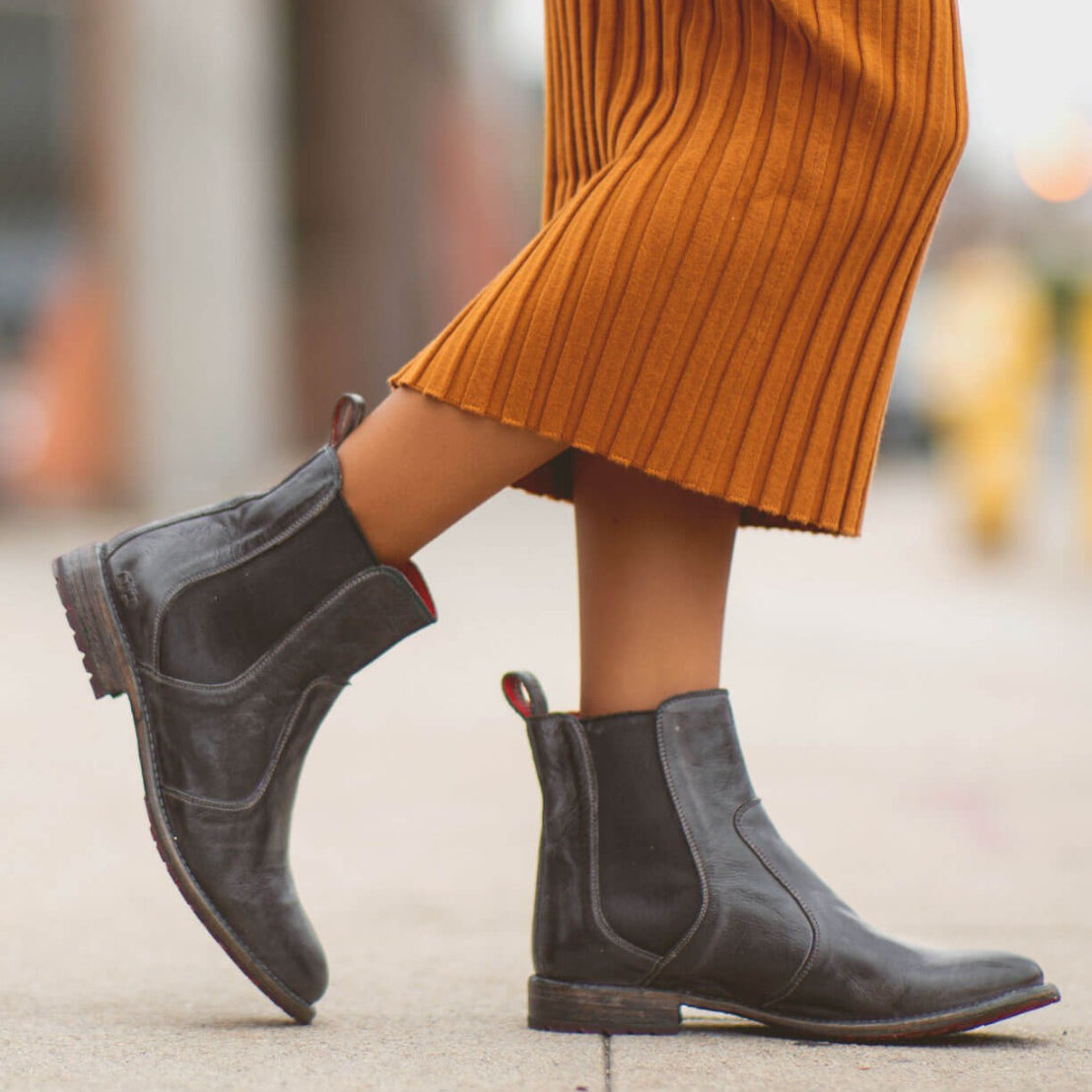 A woman wearing black Nandi Chelsea boots by Bed Stu.