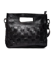 A black woven Orchid handbag by Bed Stu.