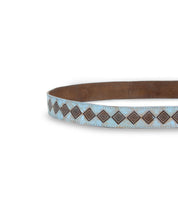 Close-up of the Bed Stu Roam belt in light blue and brown, showcasing a sophisticated geometric diamond pattern with an Aztec vibe.