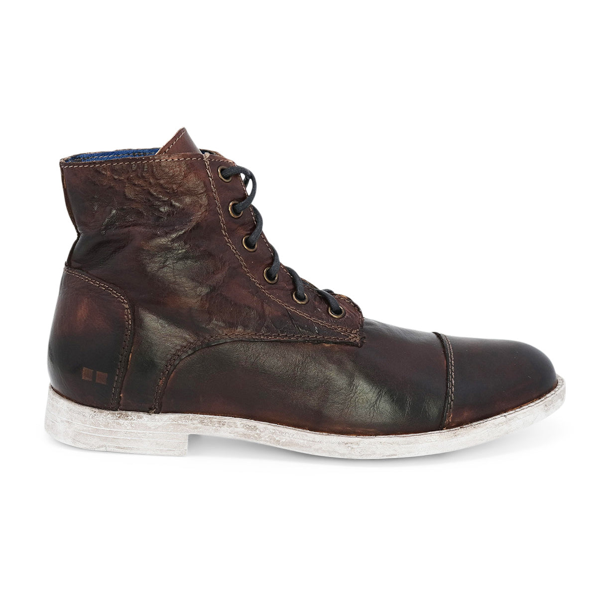 A men's brown leather boot with white soles, the Leonardo by Bed Stu.