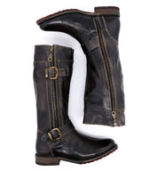 A pair of Gogo Lug black leather boots with buckles by Bed Stu.