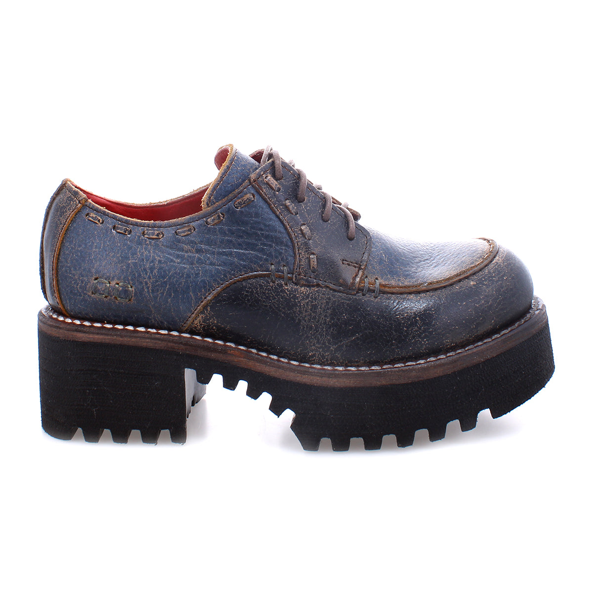 A pair of blue Bed Stu Yazar oxford shoes with black soles.